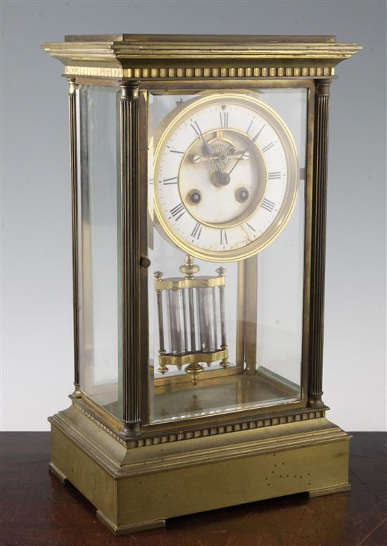 An early 20th century brass four glass mantel clock, 14.75in.